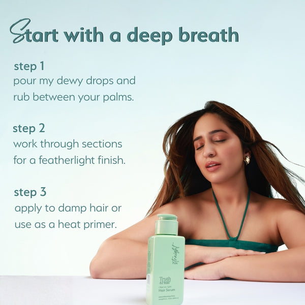 A woman with straight hair rests her arms on a surface with Truth & Hair Hair Serum bottle placed in front