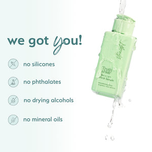 Truth & Hair Hair Serum green bottle shown under a water splash highlighting it is free of silicones and mineral oils