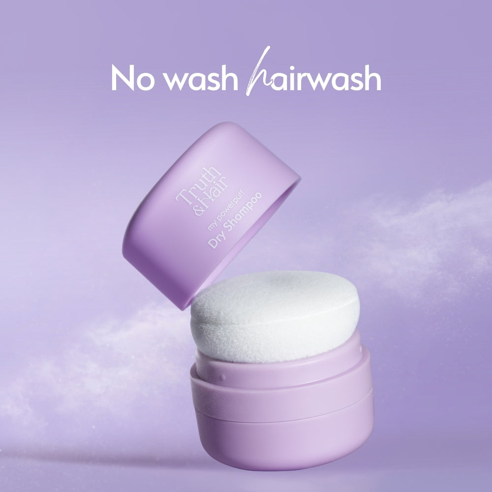 Stacked lavender compact of Truth & Hair My Powerpuff Dry Shampoo showing the mirror cap, puff applicator and product base on purple.
